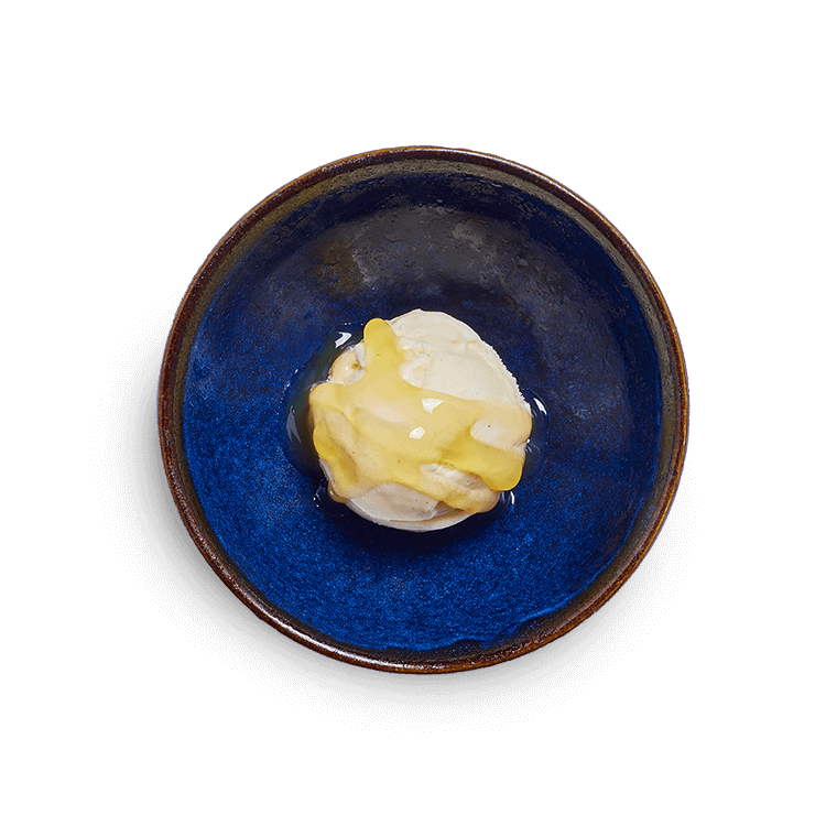 vanilla pod ice cream with passion fruit sauce